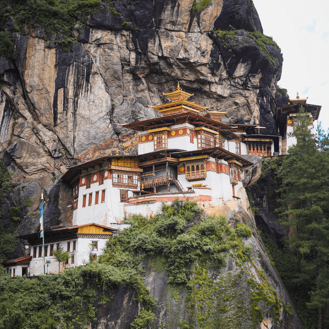 Bhutan monastery set against layered hills